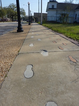 Footprints mark the route marchers took to protest Albany's segregated public sites.